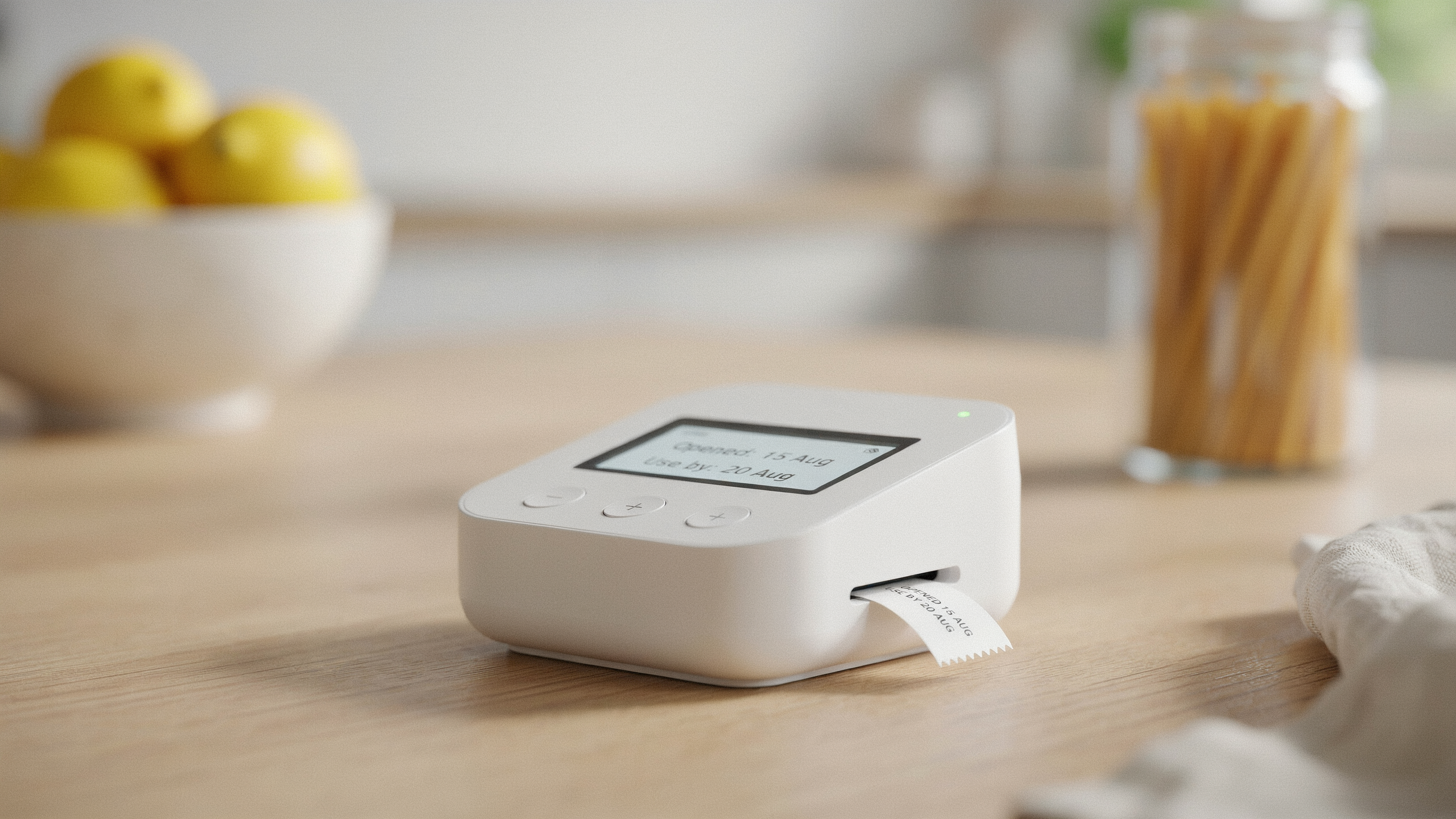 FridgeDate device on a kitchen counter